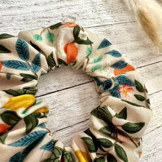 Chouchou beige avec citrons et oranges