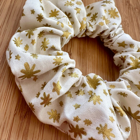 Beige scrunchie with gold snowflakes