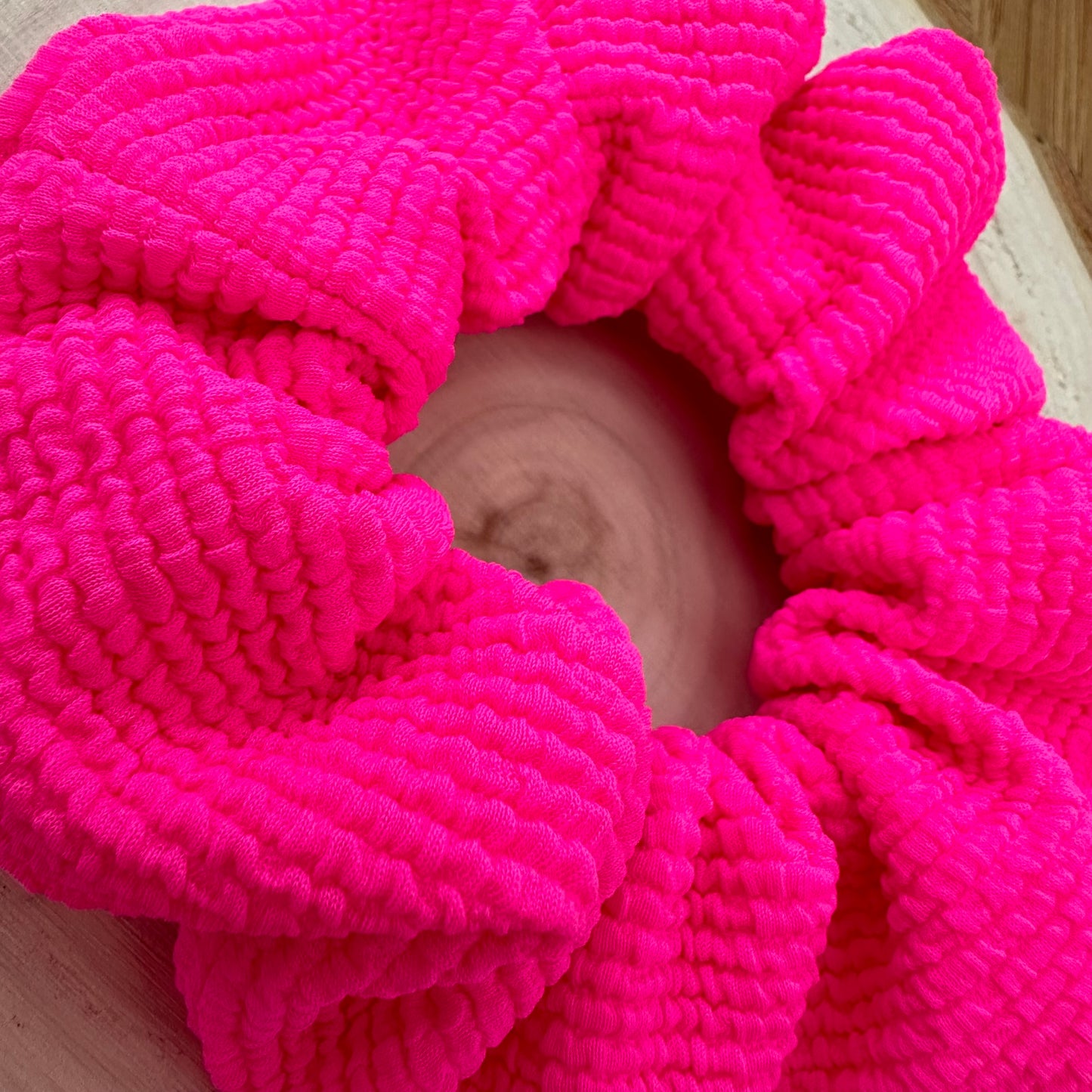 Neon pink textured swim scrunchie