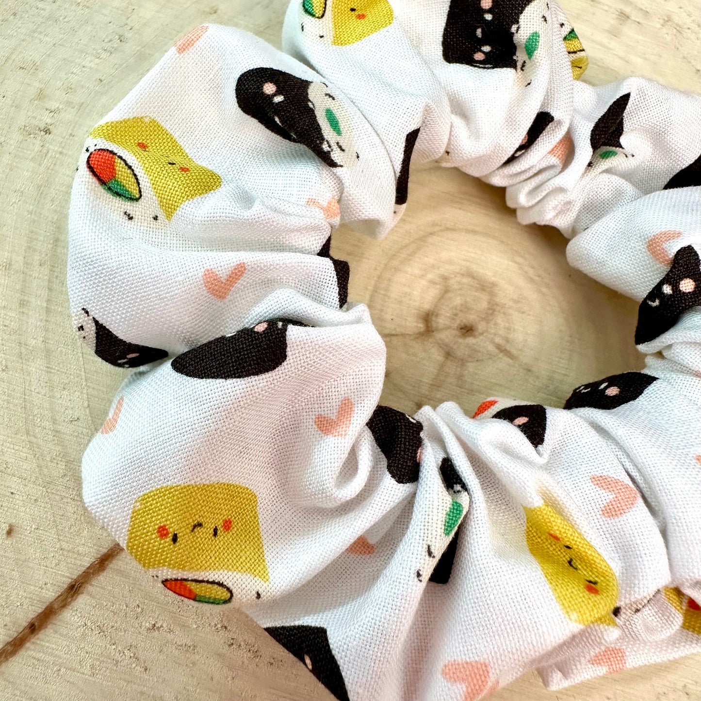 White scrunchie with sushi patterns