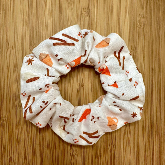 White scrunchie with autumn patterns (coffee, pie, flowers, etc.)