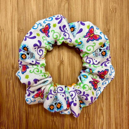 White scrunchie with multicolored calaveras