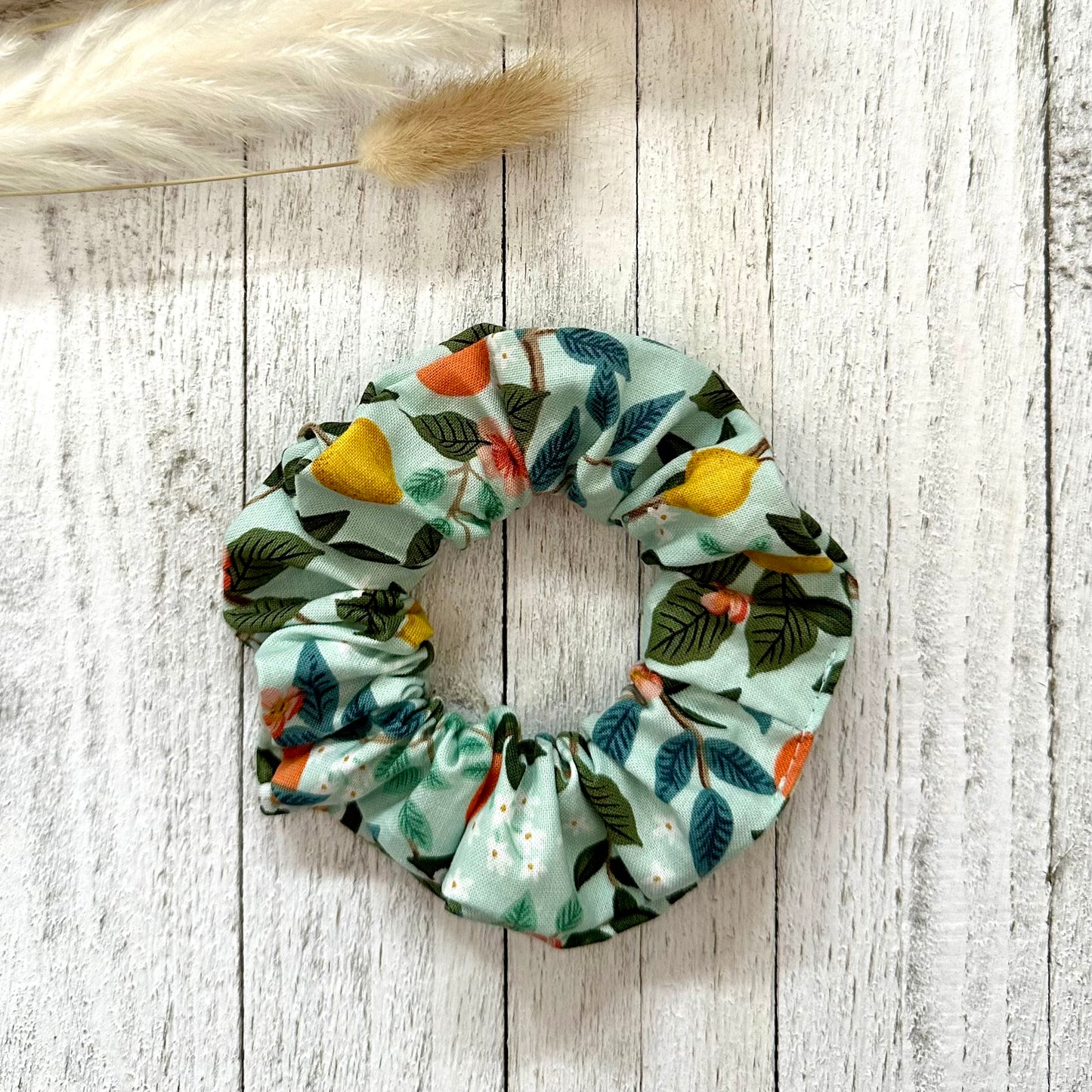 Light blue scrunchie with lemons and oranges