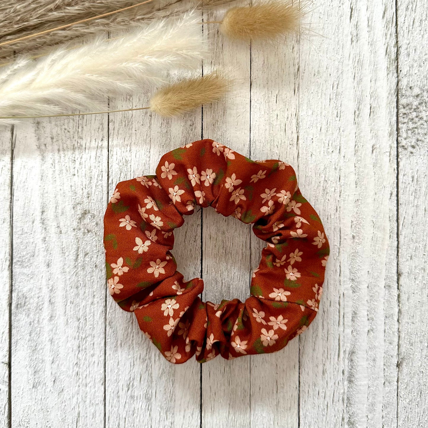 Burnt orange scrunchie with little flowers