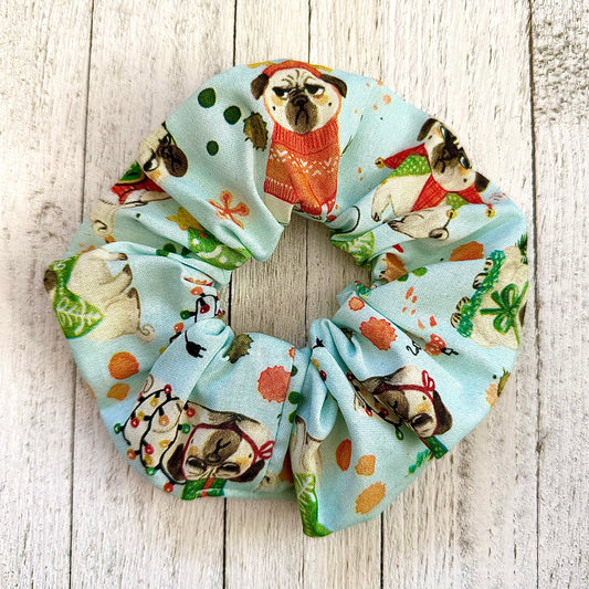 Medium sized light blue scrunchie with Christmas pugs