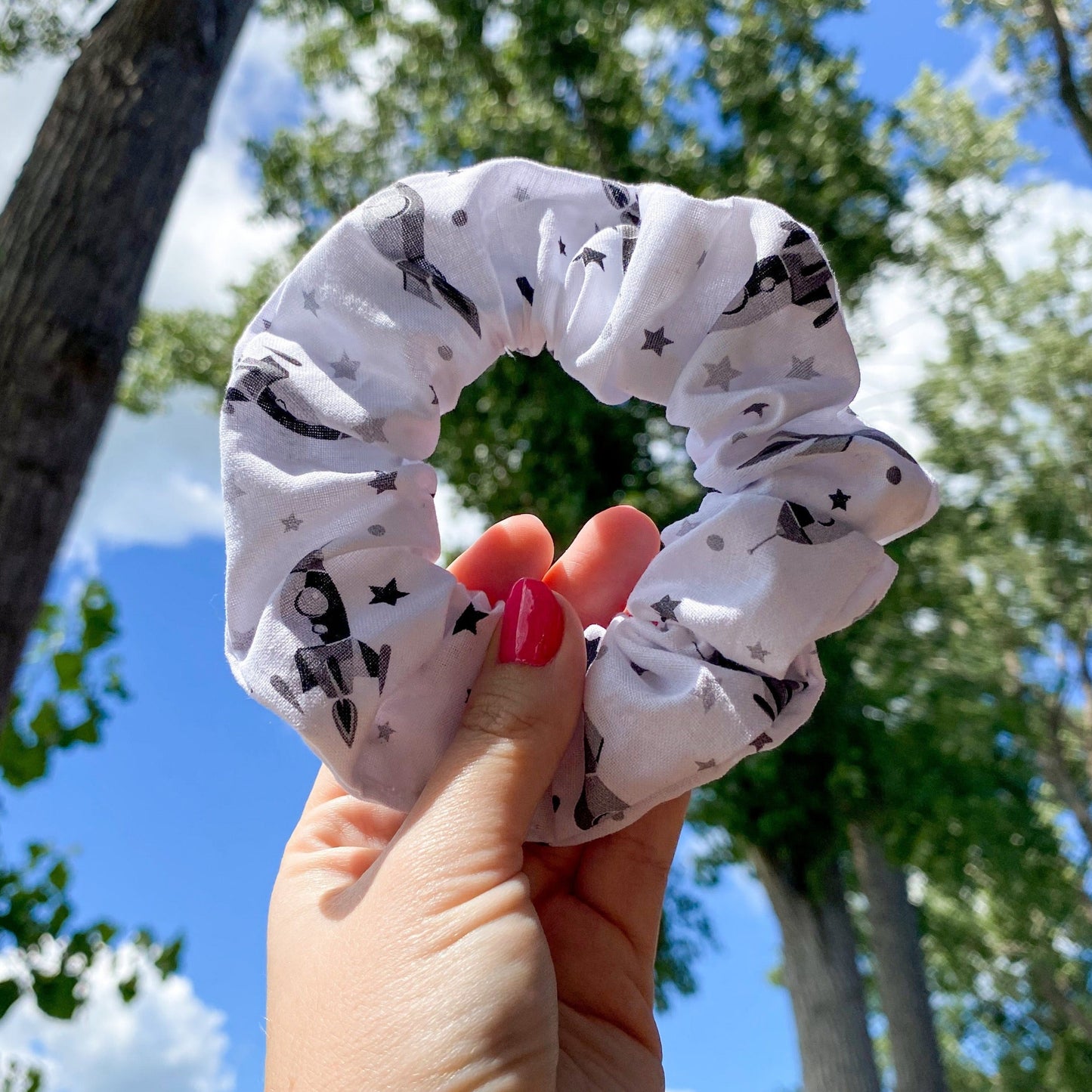 White scrunchie with rockets and stars