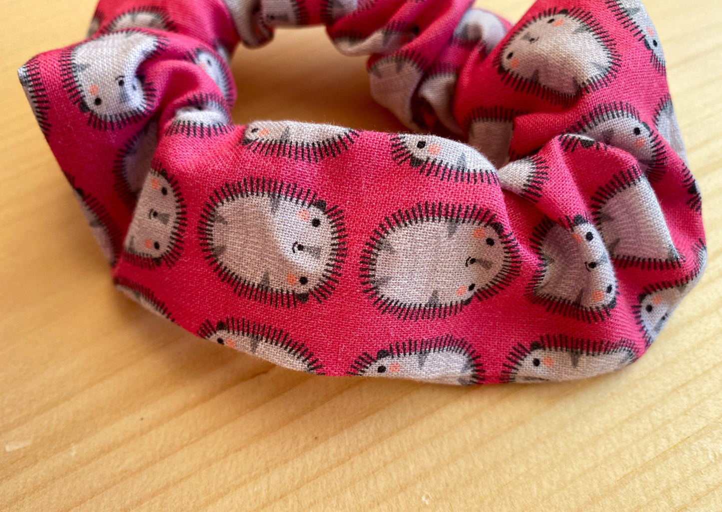 Pink scrunchie with hedgehogs