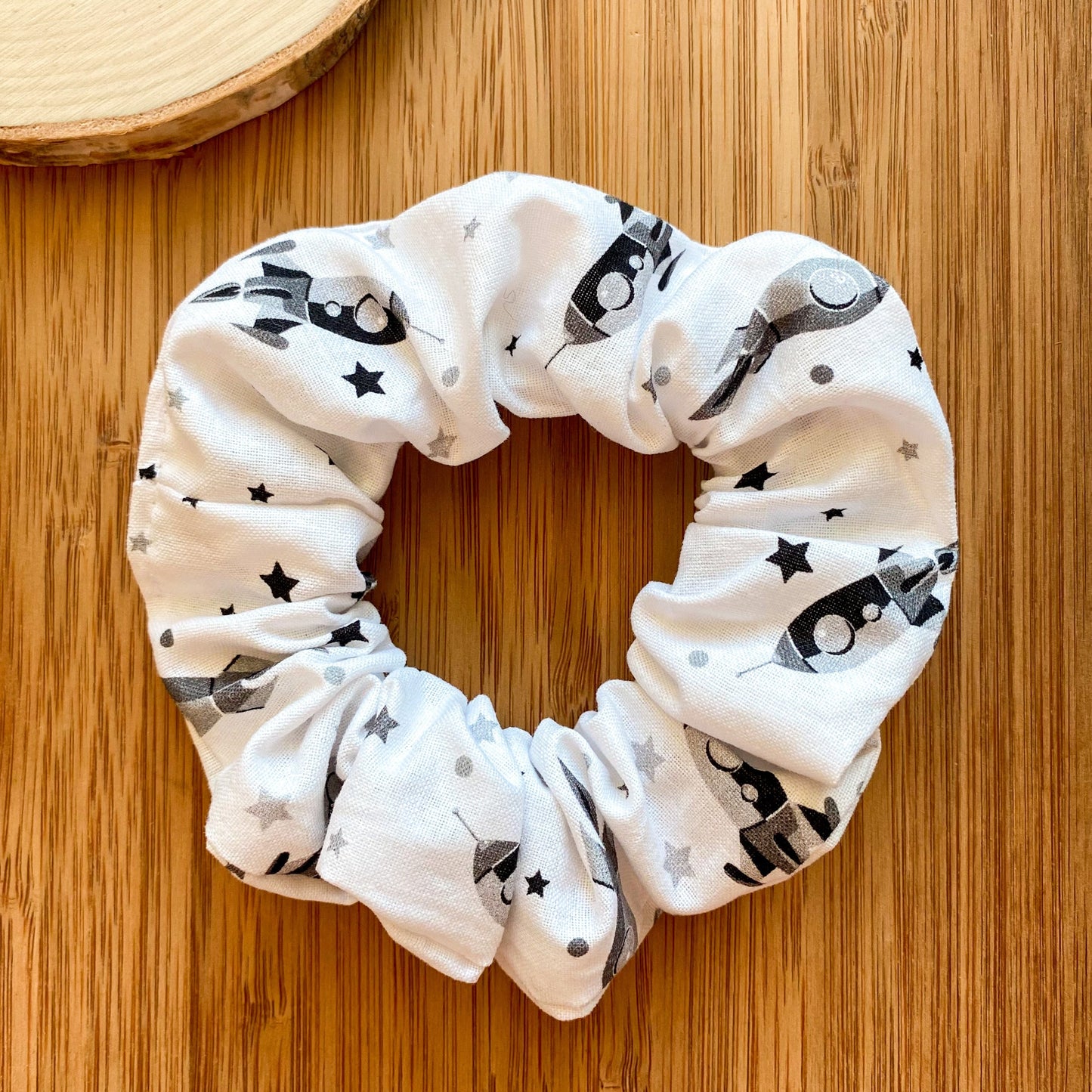 White scrunchie with rockets and stars