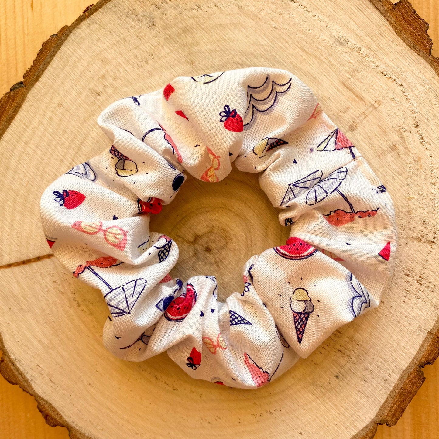 White scrunchie with summer patterns (ice cream, watermelons, etc.)