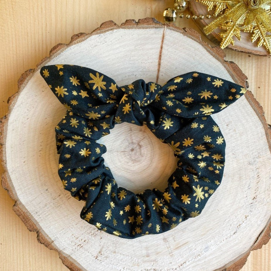 Dark green bow scrunchie with gold snowflakes